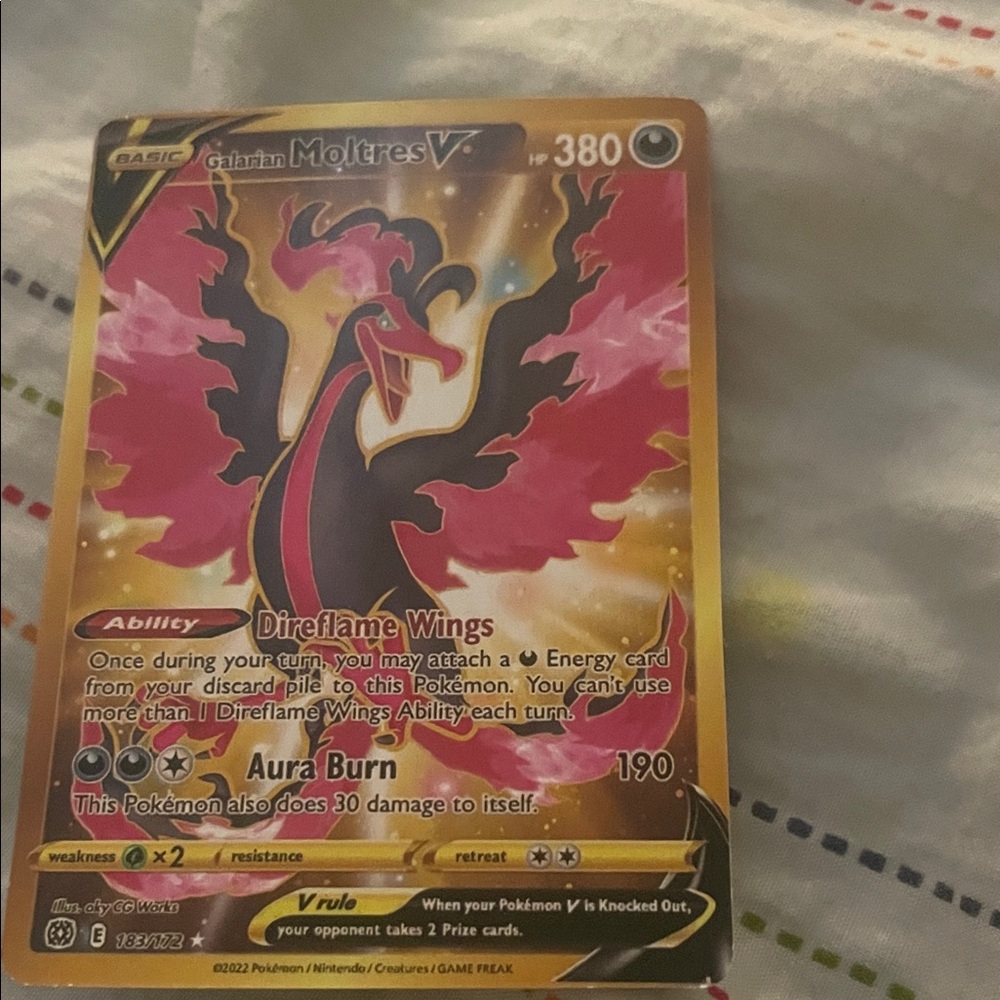 Pokemon Card with Red and Black Design